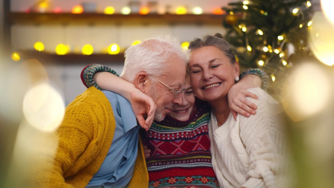 Recommended Gifts for Seniors 1 Gifts for seniors - Family hugging and smiling