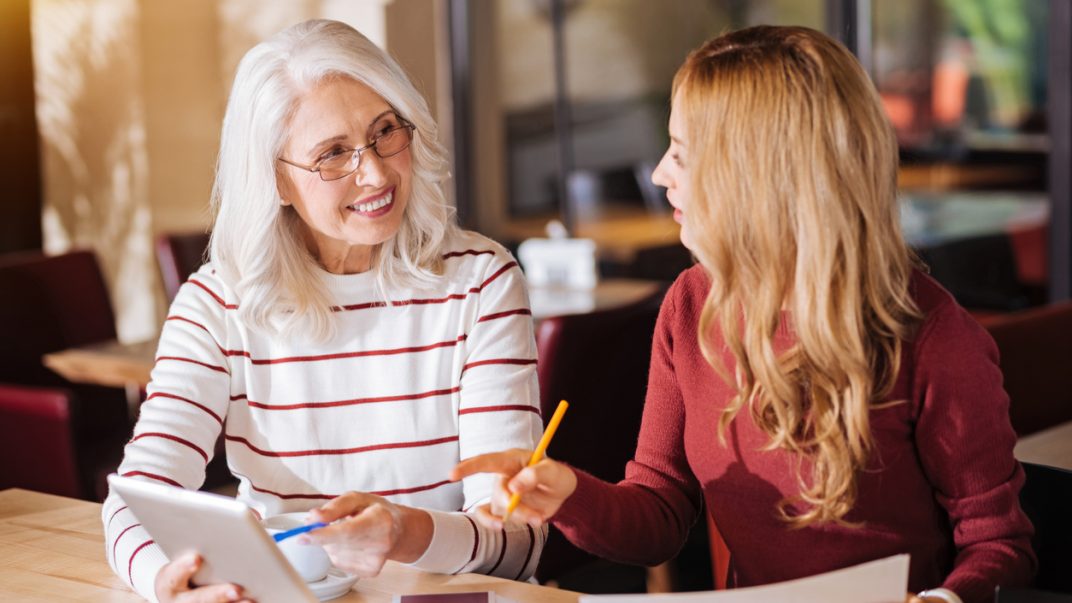 Having ‘the talk’: The benefits of making your wishes known about end-of-life care 1 Older adult female and young adult female having a discussion at a cafe.
