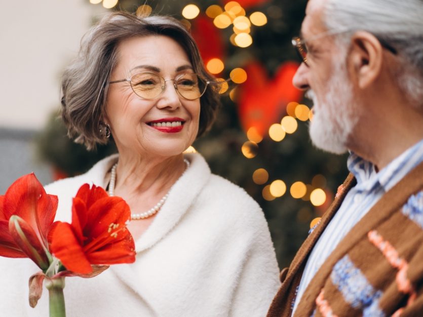 Senior couple smiling at each other - What to Notice When Visiting Aging Parents Over the Holidays