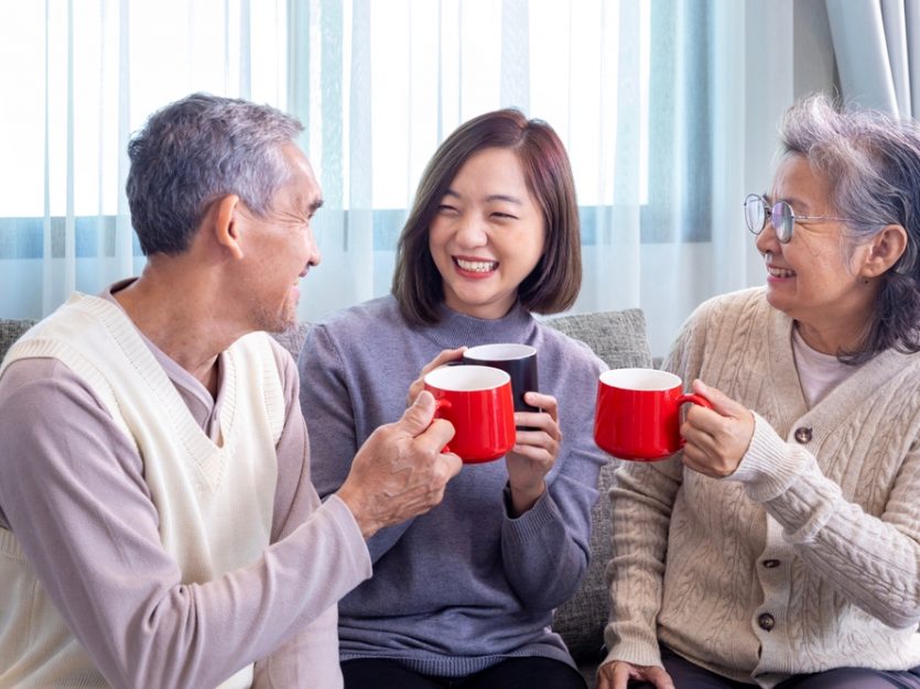 Three people enjoying hot chocolate together - viral hot chocolate recipe